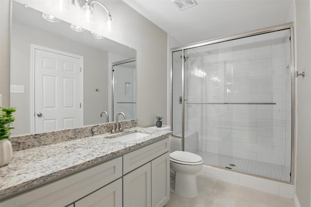 bathroom featuring vanity, shower / tub combination, and toilet