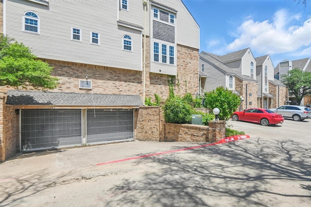 view of property featuring an attached garage