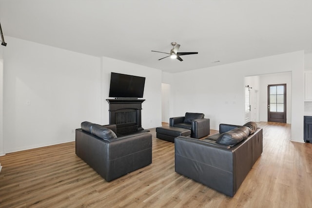 3120 Bent Creek Dr, Anna, TX 75409 - living area with a fireplace, light wood-style flooring, and a ceiling fan