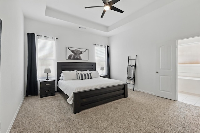 3120 Bent Creek Dr, Anna, TX 75409 - bedroom with light carpet, a raised ceiling, baseboards, and a ceiling fan