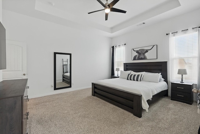 3120 Bent Creek Dr, Anna, TX 75409 - bedroom featuring a raised ceiling, light carpet, baseboards, and ceiling fan