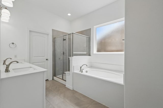3120 Bent Creek Dr, Anna, TX 75409 - bathroom featuring a sink, a shower stall, a garden tub, and recessed lighting