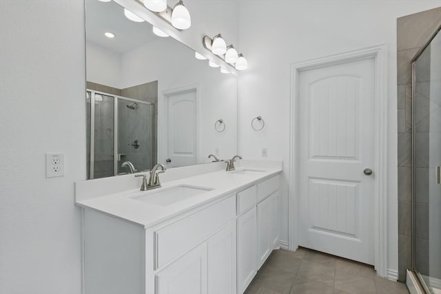 3120 Bent Creek Dr, Anna, TX 75409 - bathroom featuring a shower stall, double vanity, and tile patterned flooring