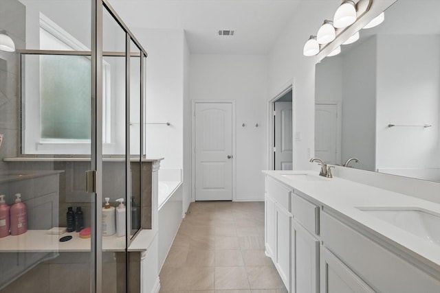 3120 Bent Creek Dr, Anna, TX 75409 - full bathroom with a bath, a shower stall, double vanity, and tile patterned floors