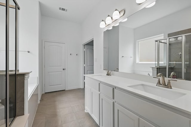 3120 Bent Creek Dr, Anna, TX 75409 - full bathroom featuring a stall shower, a garden tub, and double vanity
