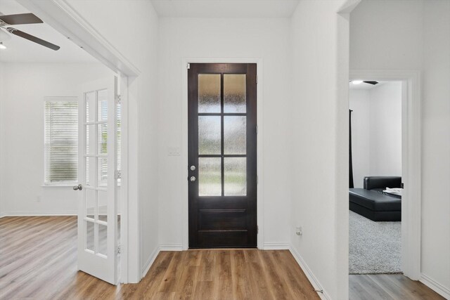 3120 Bent Creek Dr, Anna, TX 75409 - foyer entrance featuring wood finished floors, ceiling fan, and baseboards