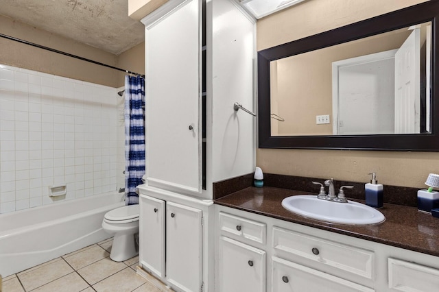 1502 Hinchliffe Rd, Mexia, TX 76667 - full bathroom featuring vanity, toilet, tile patterned flooring, and shower / bath combo with shower curtain