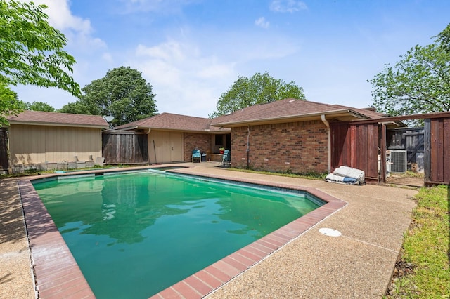 1502 Hinchliffe Rd, Mexia, TX 76667 - view of swimming pool with fence, a fenced in pool, and cooling unit