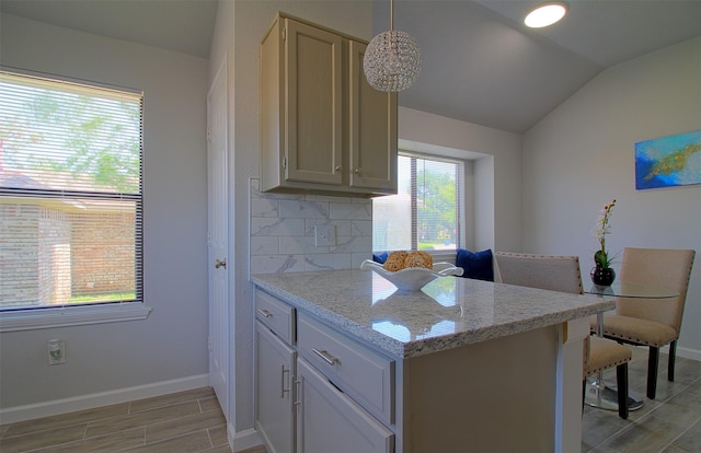 405 Derby Ln, Desoto, TX 75115 - kitchen with a peninsula, vaulted ceiling, baseboards, decorative backsplash, and wood tiled floor