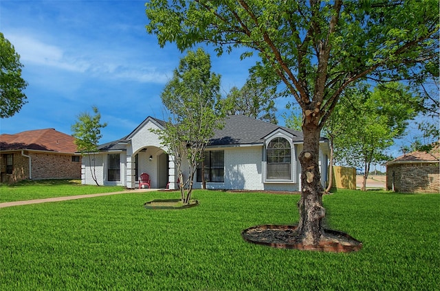 405 Derby Ln, Desoto, TX 75115 - ranch-style home featuring brick siding and a front lawn