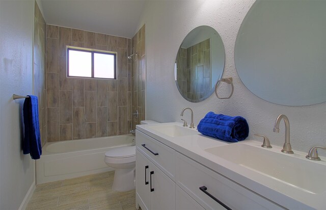 405 Derby Ln, Desoto, TX 75115 - full bathroom featuring toilet, shower / bathtub combination, a sink, and double vanity