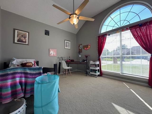 bedroom with carpet floors, a ceiling fan, and vaulted ceiling