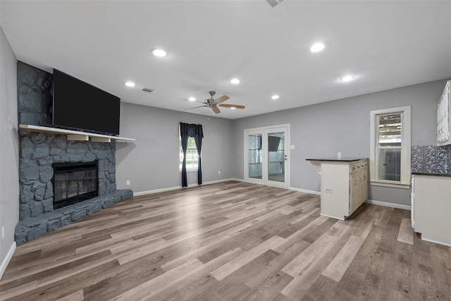117 W Craven Ave, Lacy Lakeview, TX 76705 - unfurnished living room featuring a ceiling fan, plenty of natural light, recessed lighting, and light wood-style floors