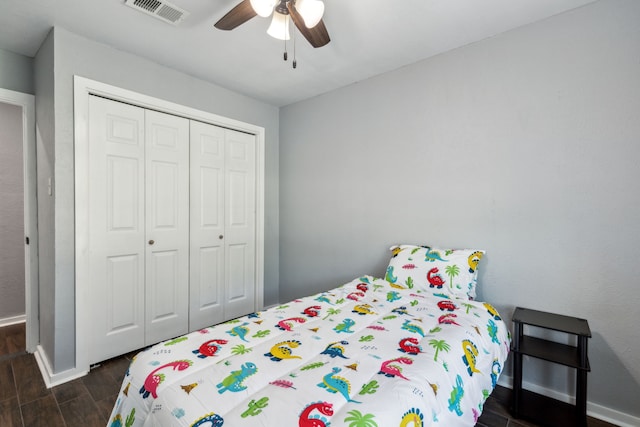 609 Admiralty Way, Fort Worth, TX 76108 - bedroom with baseboards, visible vents, a ceiling fan, a closet, and dark wood-type flooring