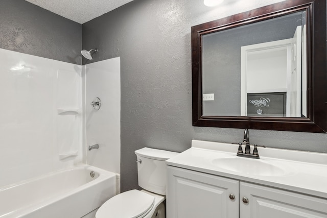 609 Admiralty Way, Fort Worth, TX 76108 - full bath featuring a textured ceiling, toilet, bathtub / shower combination, a textured wall, and vanity