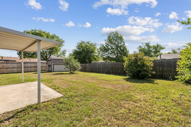 609 Admiralty Way, Fort Worth, TX 76108 - view of yard with an outdoor structure, a fenced backyard, a shed, and a patio