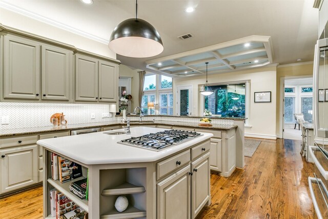 kitchen with recessed lighting, visible vents, a center island with sink, and stainless steel gas stovetop