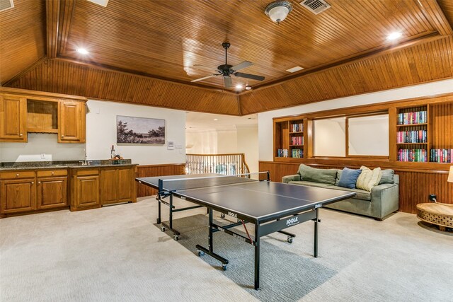 game room featuring ceiling fan, light colored carpet, wooden ceiling, and visible vents