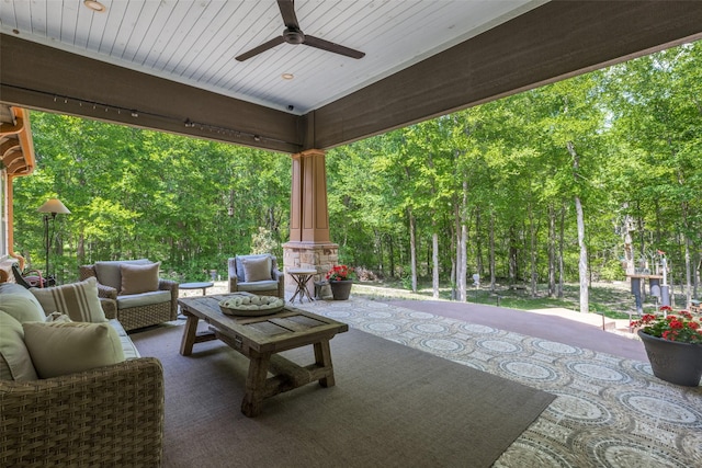 view of patio / terrace with an outdoor living space and ceiling fan