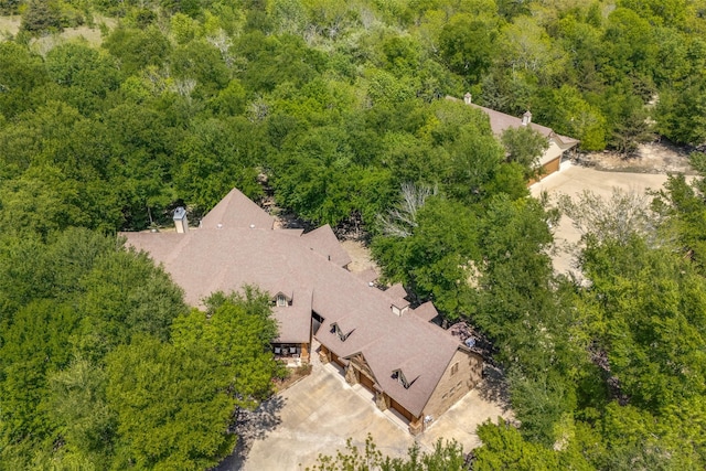 aerial view with a wooded view