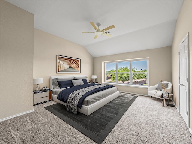 carpeted bedroom featuring vaulted ceiling, a ceiling fan, visible vents, and baseboards