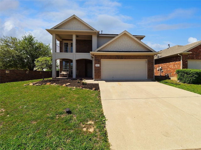 view of front of house with a front lawn, driveway, a garage, brick siding, and a balcony