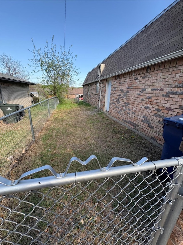 view of yard with fence