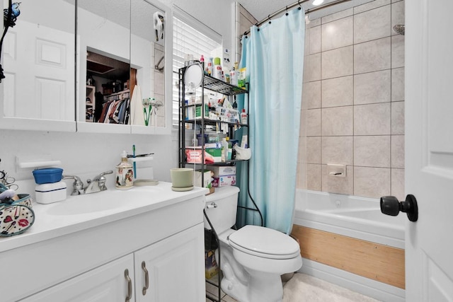 bathroom with shower / bath combo, vanity, and toilet