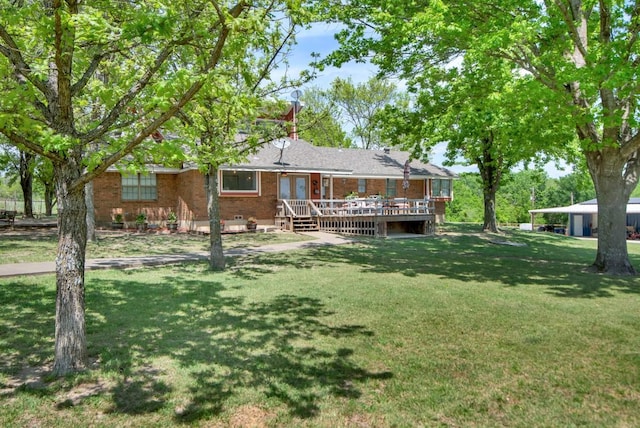 view of yard featuring a deck