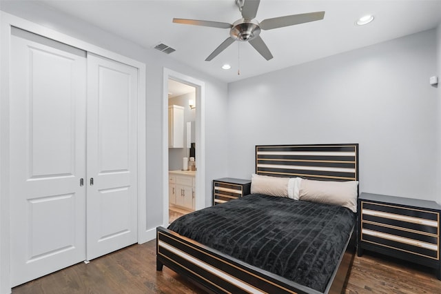 bedroom featuring wood finished floors, visible vents, recessed lighting, and a closet