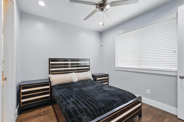 bedroom featuring baseboards, a ceiling fan, wood finished floors, and recessed lighting