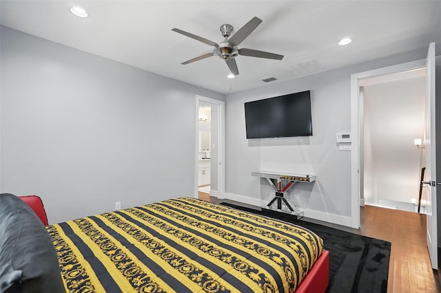 bedroom featuring visible vents, wood finished floors, and recessed lighting