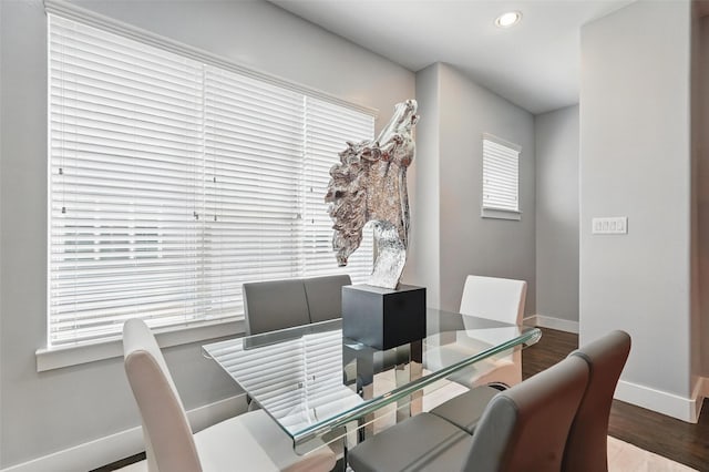 dining room with recessed lighting, wood finished floors, and baseboards
