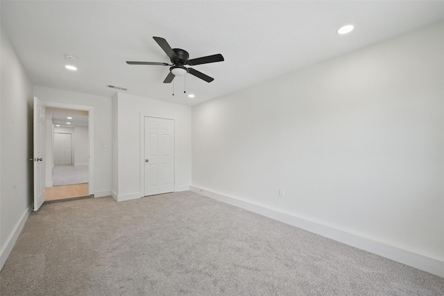 unfurnished bedroom with light carpet, baseboards, visible vents, recessed lighting, and ceiling fan