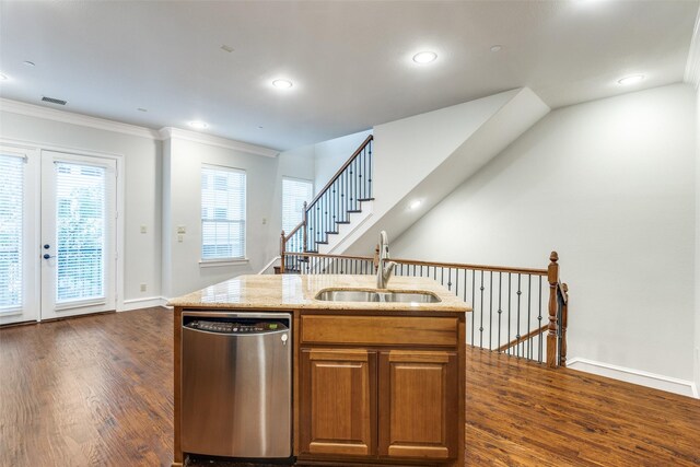 kitchen with a sink, crown molding, dark wood-style flooring, and dishwasher