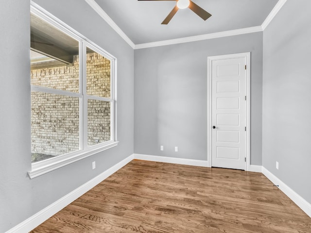 117 Fan Mill Trl, Weatherford, TX 76085 - empty room featuring baseboards, a ceiling fan, wood finished floors, and crown molding