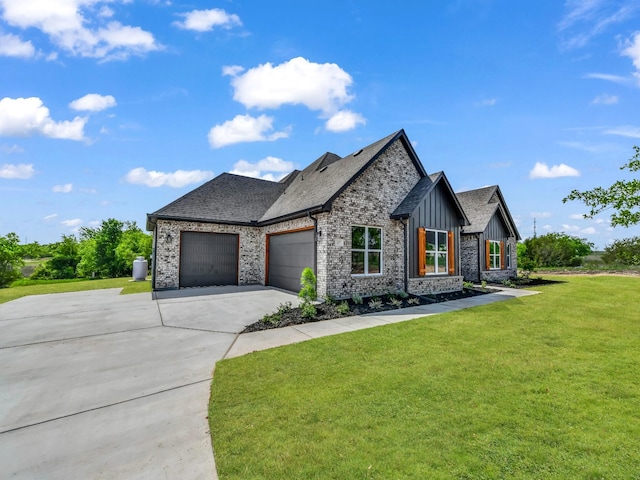 117 Fan Mill Trl, Weatherford, TX 76085 - craftsman house featuring a shingled roof, a front lawn, concrete driveway, an attached garage, and board and batten siding