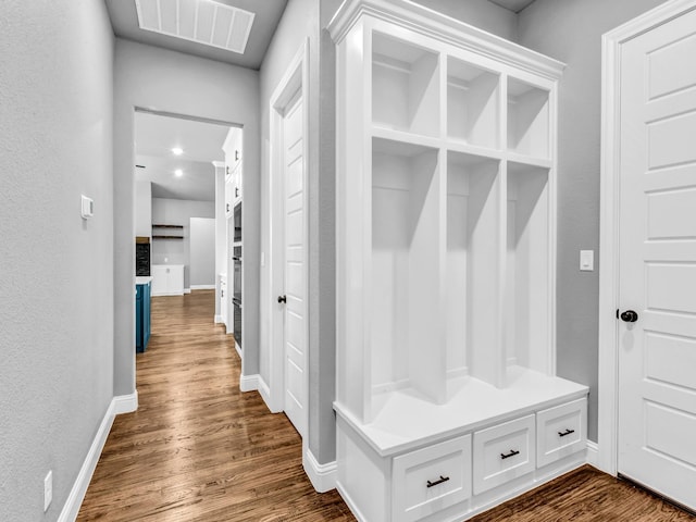 117 Fan Mill Trl, Weatherford, TX 76085 - mudroom featuring baseboards, visible vents, and dark wood-style floors