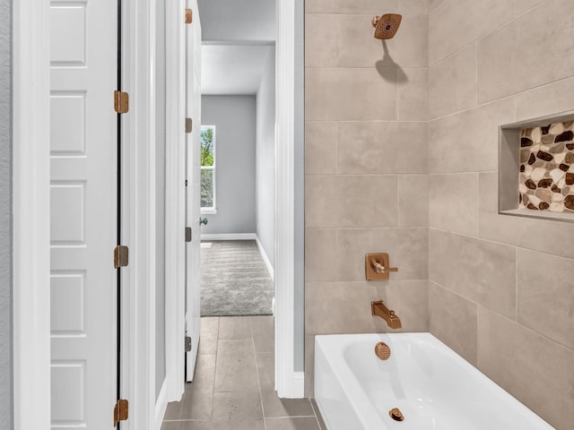 117 Fan Mill Trl, Weatherford, TX 76085 - full bath featuring baseboards, tile patterned flooring, and washtub / shower combination