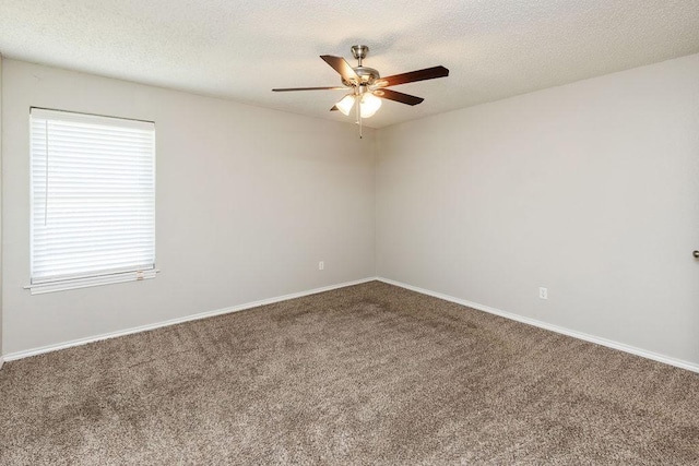 unfurnished room with baseboards, carpet flooring, a textured ceiling, and ceiling fan