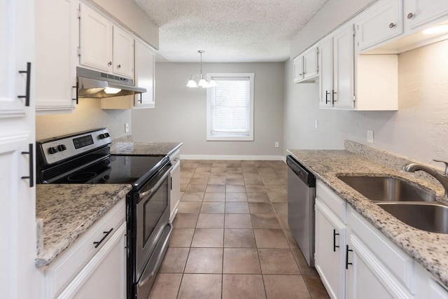 kitchen featuring white cabinets, appliances with stainless steel finishes, under cabinet range hood, and a sink