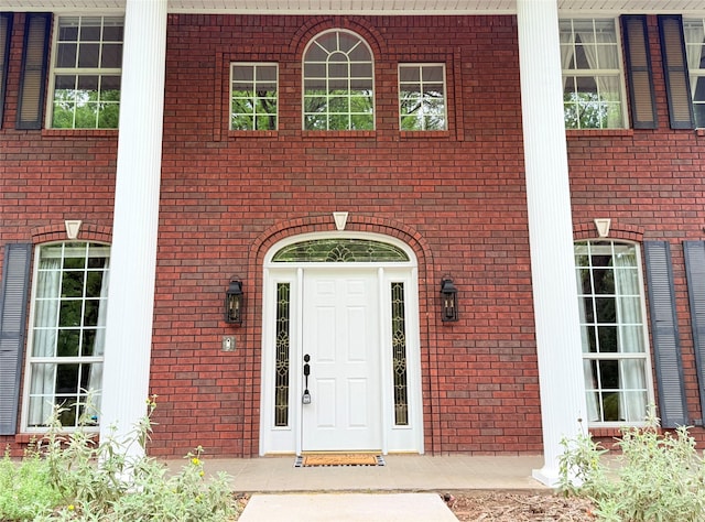 516 Wild Wood Dr, Decatur, TX 76234 - entrance to property featuring brick siding and a porch
