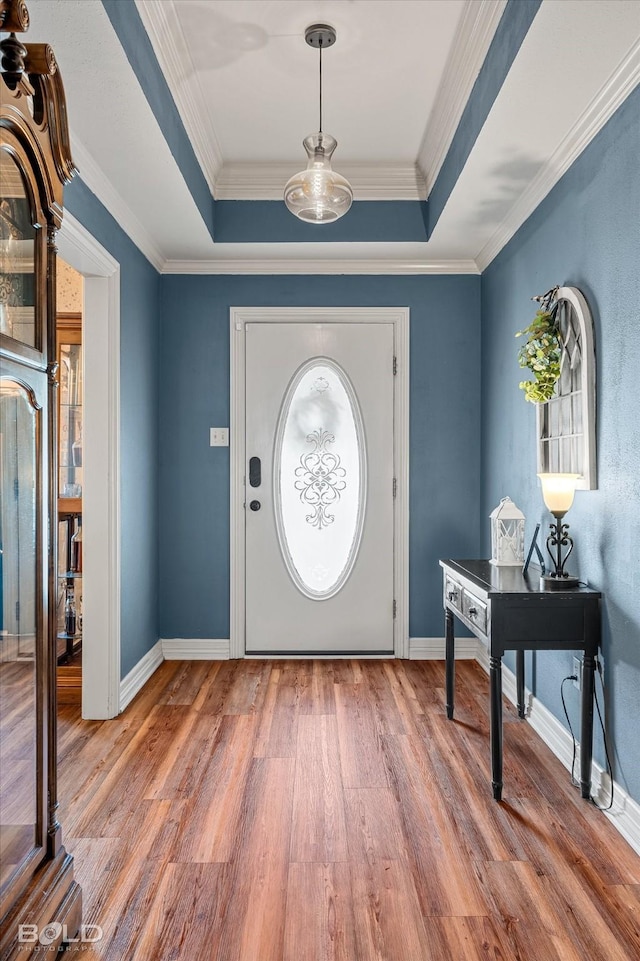 5021 Kenilworth Dr, Bossier City, LA 71112 - foyer entrance with wood finished floors, a raised ceiling, crown molding, and baseboards