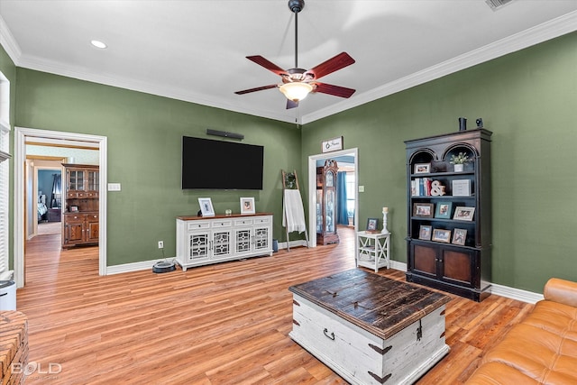 5021 Kenilworth Dr, Bossier City, LA 71112 - living room with crown molding, ceiling fan, light wood-style floors, and baseboards