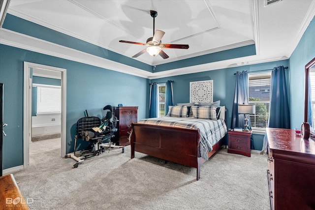 5021 Kenilworth Dr, Bossier City, LA 71112 - carpeted bedroom with a tray ceiling, ornamental molding, multiple windows, and baseboards