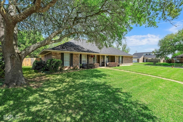 5021 Kenilworth Dr, Bossier City, LA 71112 - ranch-style home featuring brick siding and a porch