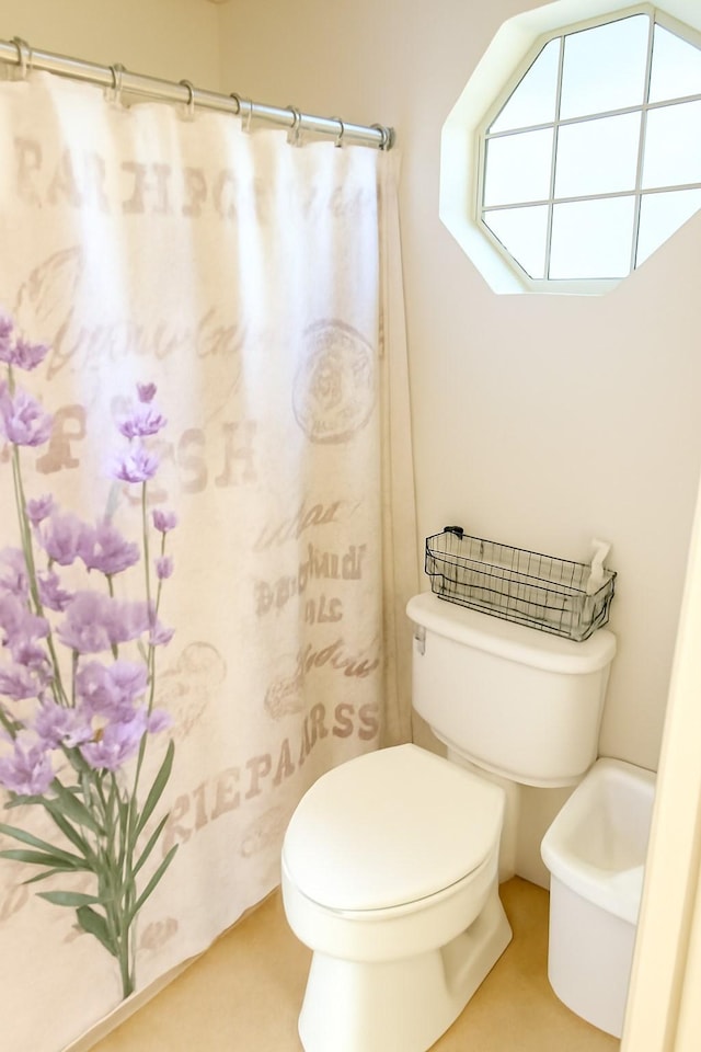 5021 Kenilworth Dr, Bossier City, LA 71112 - bathroom with toilet and curtained shower