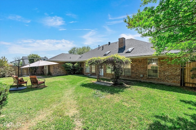5021 Kenilworth Dr, Bossier City, LA 71112 - rear view of property with brick siding, a chimney, and a shingled roof