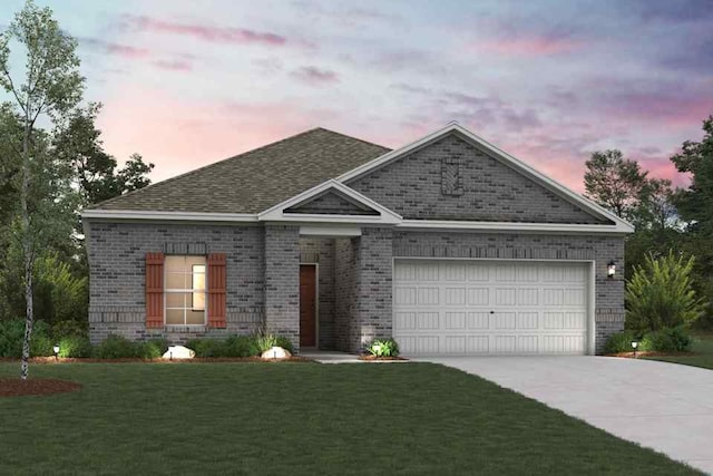 ranch-style home featuring a lawn, driveway, an attached garage, brick siding, and roof with shingles