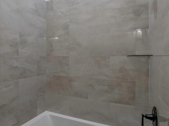 details featuring a washtub and walk in shower